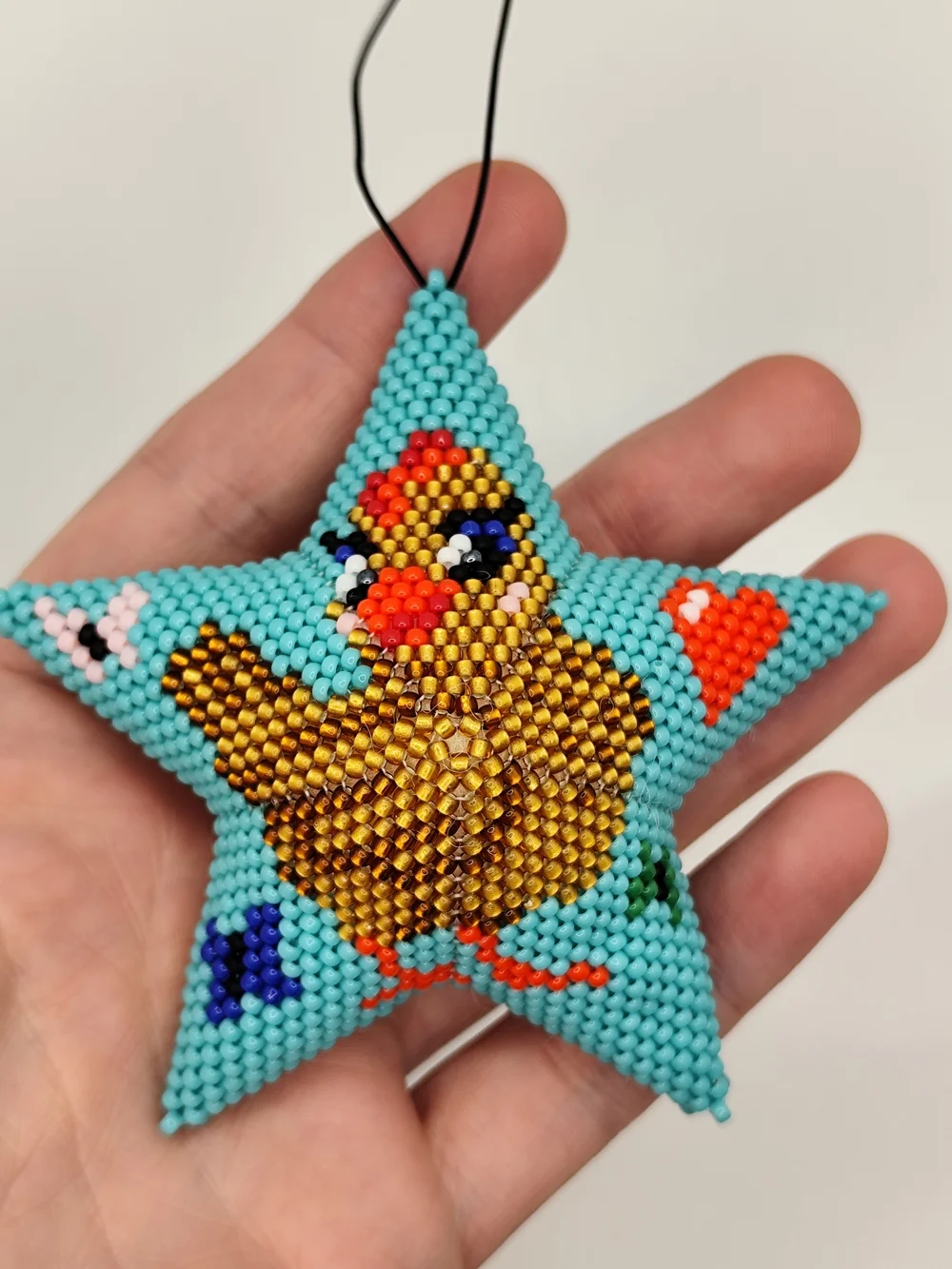 Handmade Turquoise Star Ornament with Beaded Chick Motif